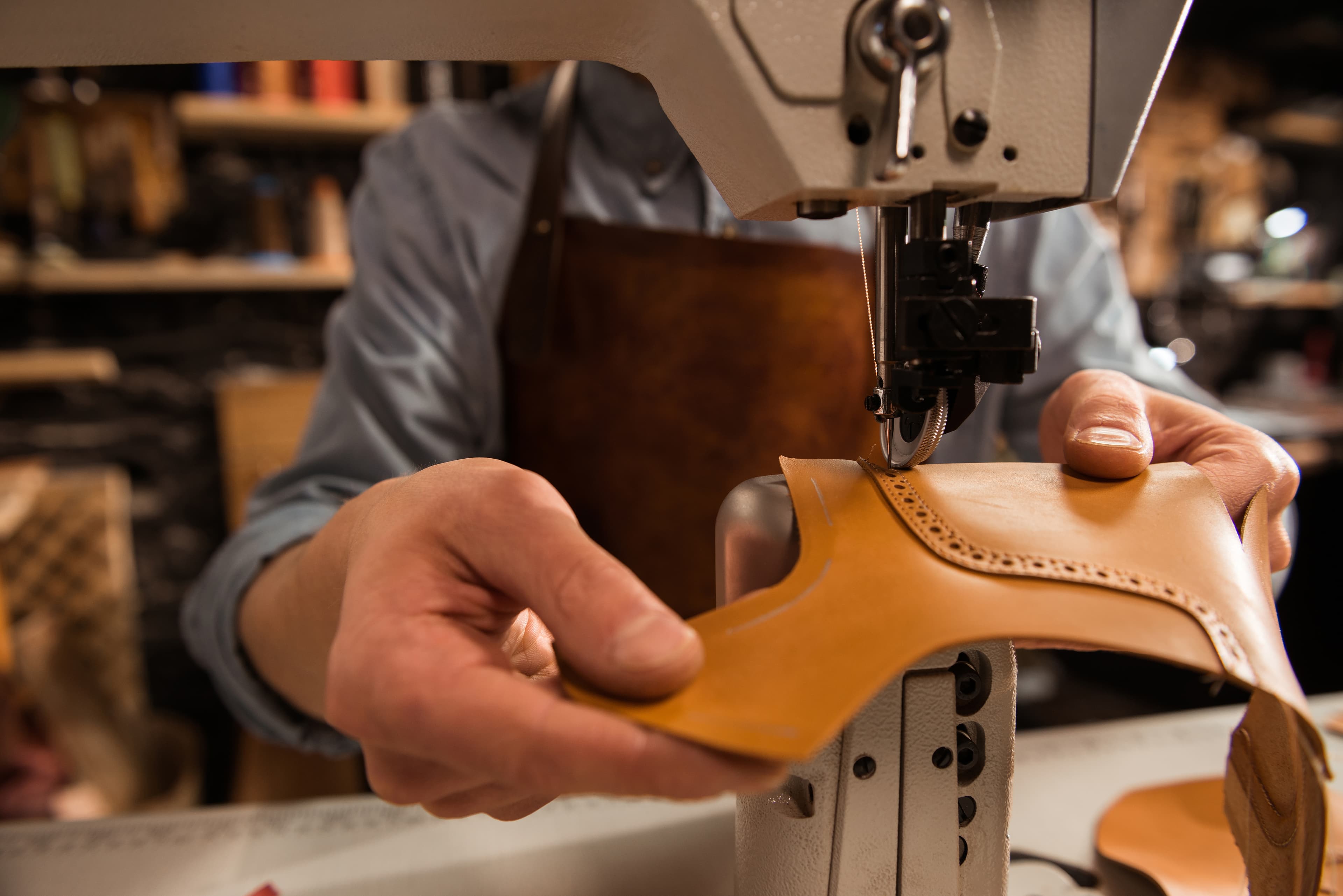 Leather craftsmanship imagery.